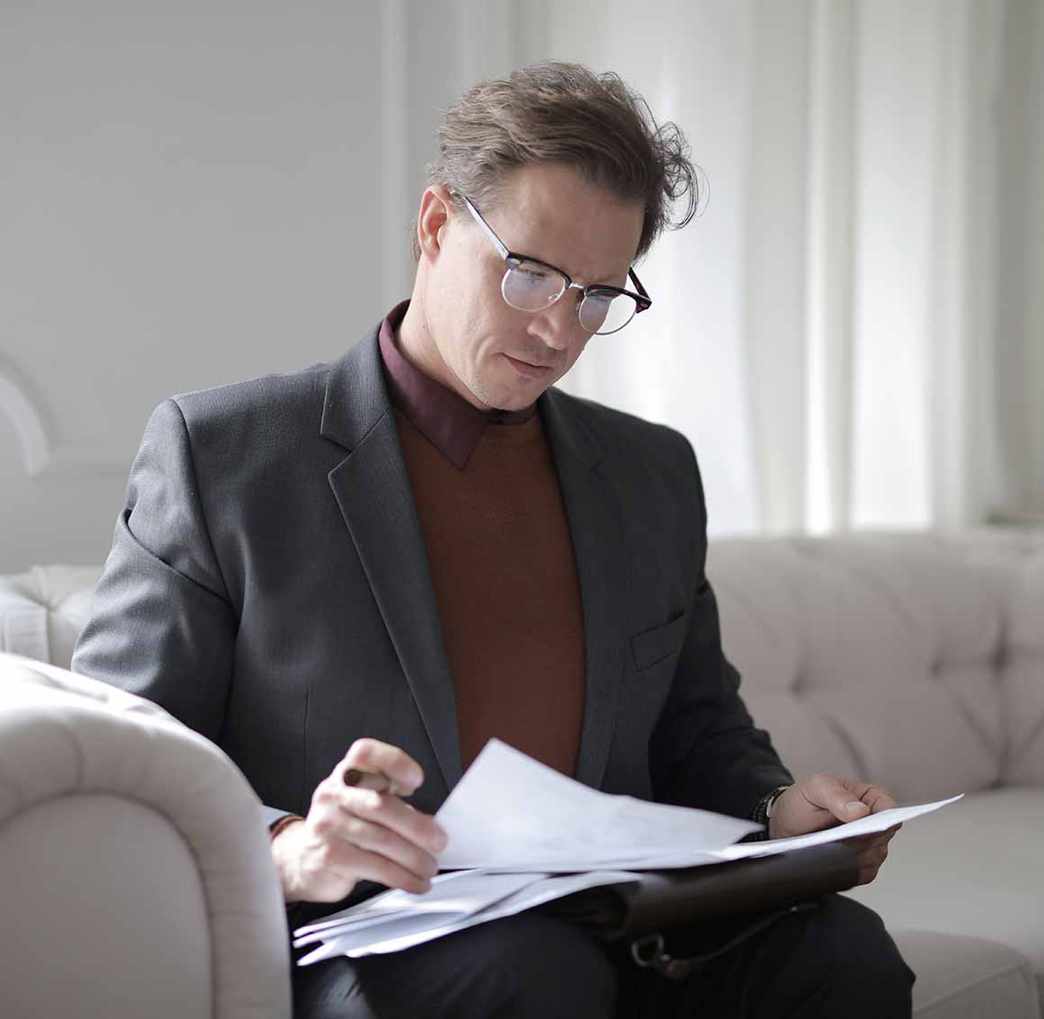 Service Portfolio Man looking over paperwork
