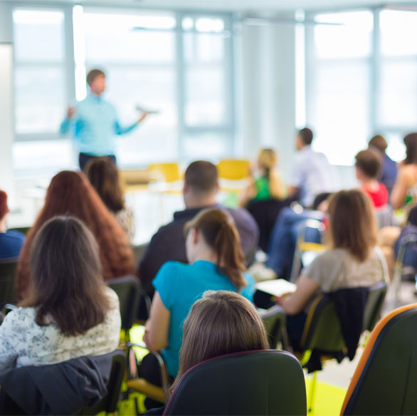 lecture hall of students in front of teacher